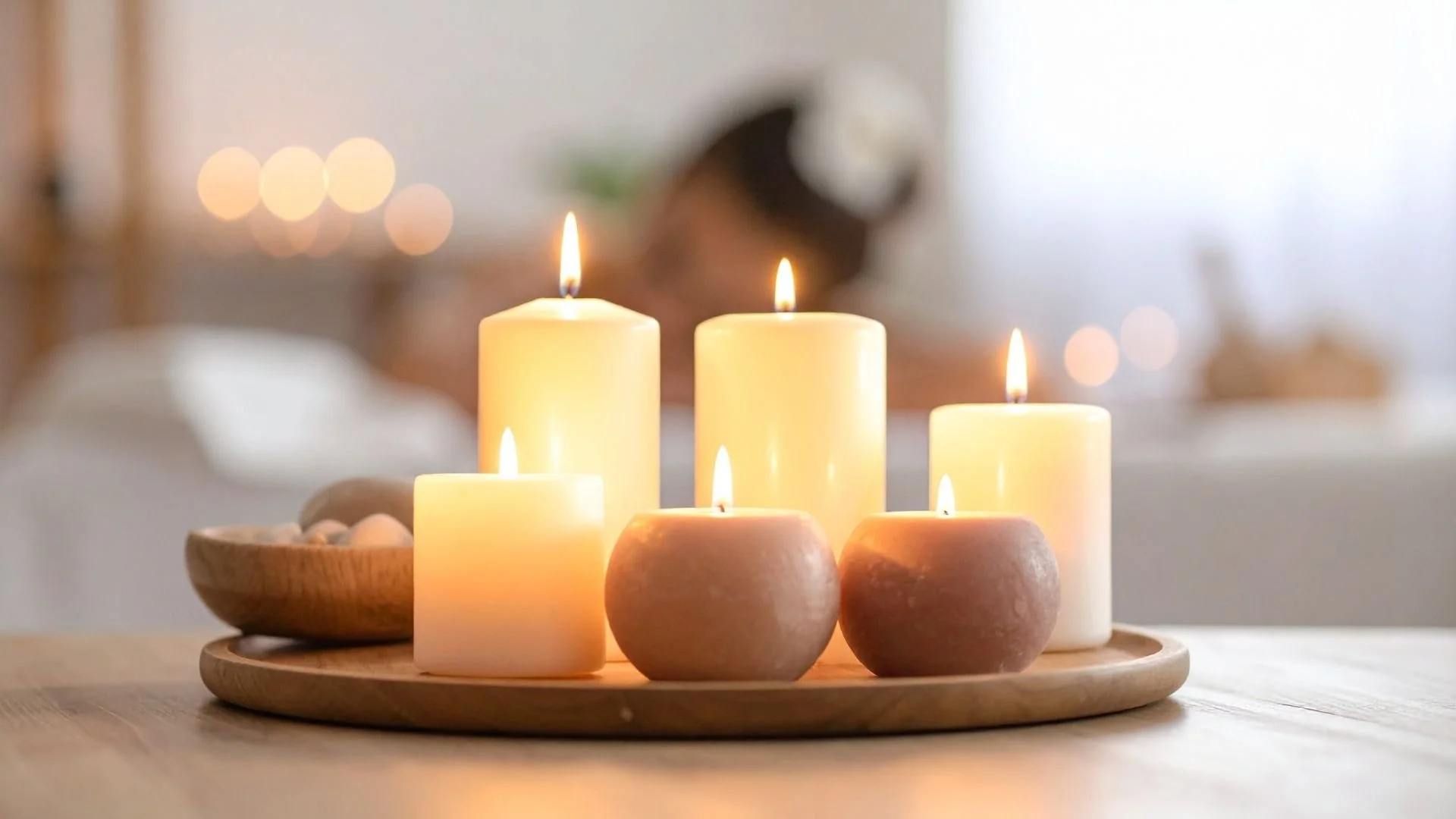 candles lit on a wooden tray representing holistic healing and alternative medicine services available in Eden Prairie Minnesota