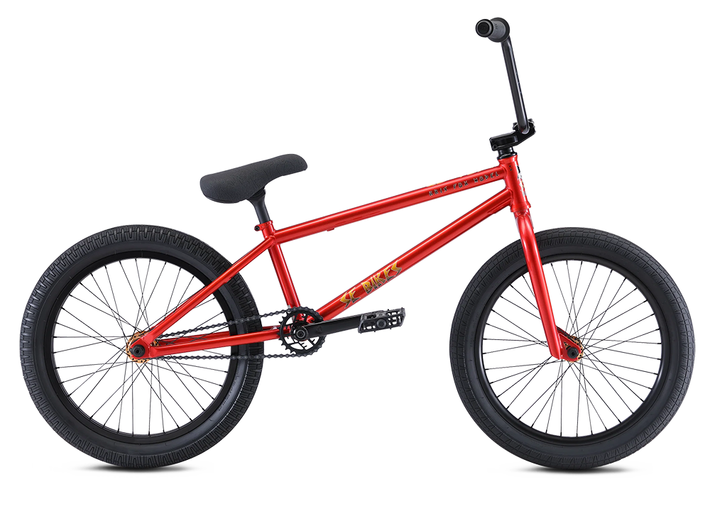 Red children's bicycle with black wheels, black seat, and black handlebars.