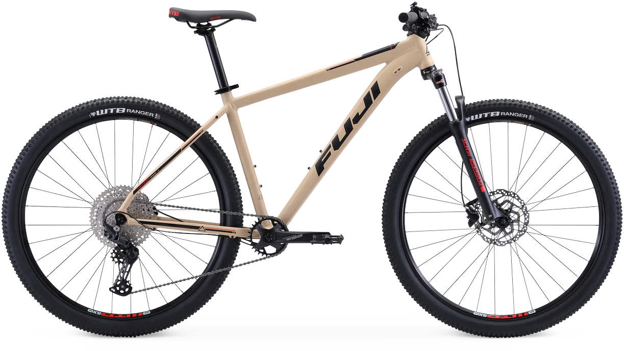 A beige full-suspension mountain bike with large tires and disc brakes, positioned against a white background.
