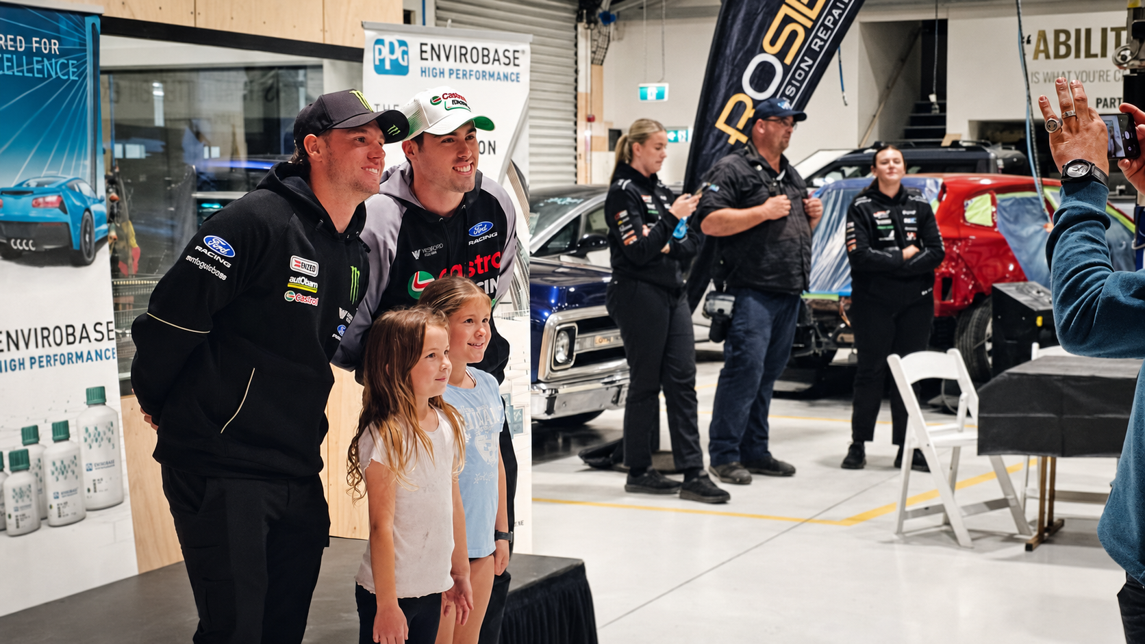 Rosiez Supercars event content featuring drivers meeting a young fan