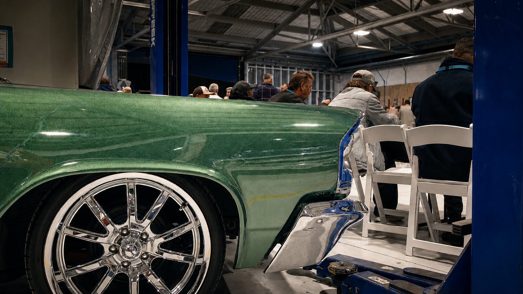 Performance car displayed with Supercars drivers in the background