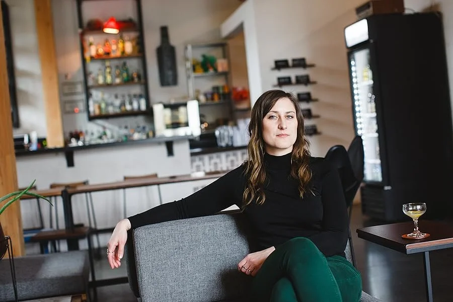 Photo of Karen Locke, Owner High-Proof Creative; this is a client testimonial for Jade Partners