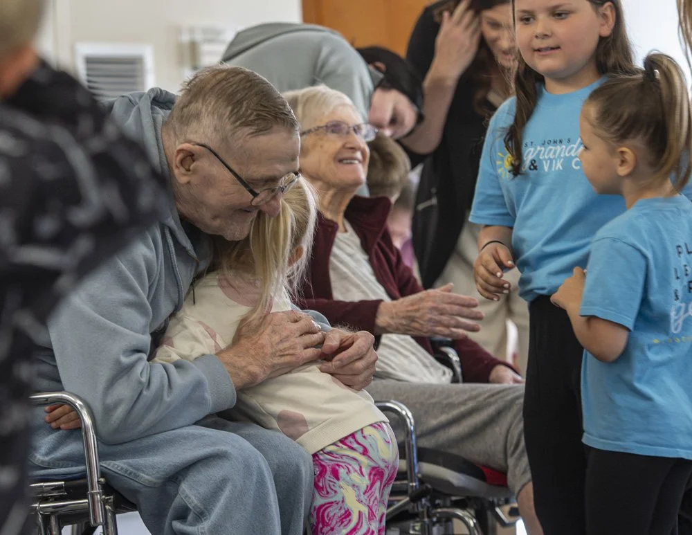 Residents enjoy daily visitors from children enrolled in Grandkids Daycare
