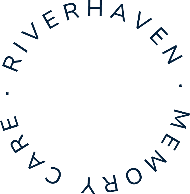 Circular logo with the text 'RIVERHAVEN, MEMORIAL, CARE'
