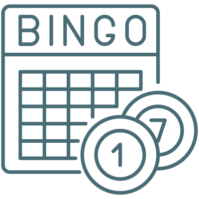 Bingo card with the word 'BINGO' at the top and two bingo balls in front of it.