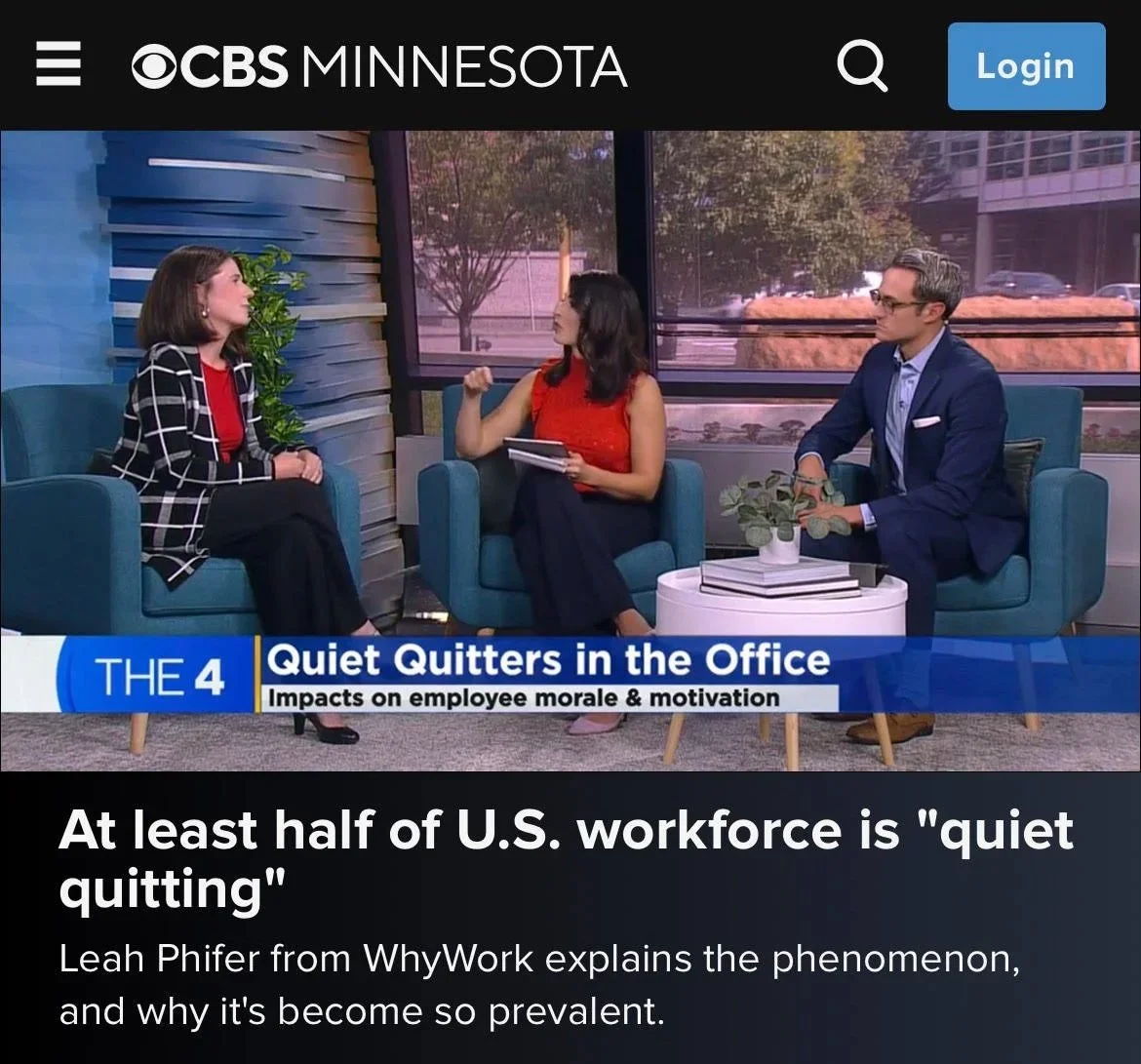 Television news segment on CBS Minnesota showing a woman being interviewed by two news anchors about the impact of quiet quitting on employee morale and motivation. The setting is a studio with large windows, a blue armchair, and a small table with books and a plant.