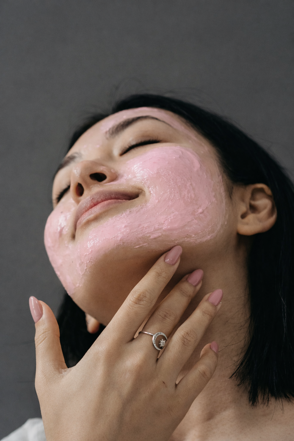 Serene+portrait+with+pink+cream+applied.png