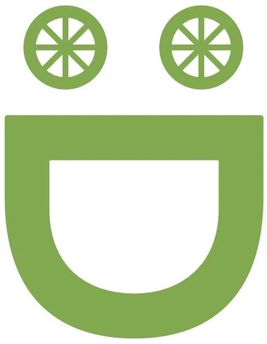 Simplified illustration of a smiling face with two lime wedges for eyes and a wide, curved mouth.