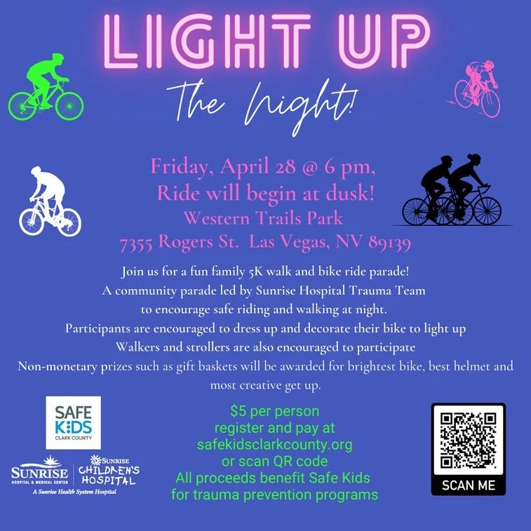 Event flyer titled 'Light Up The Night!' with colorful bike illustrations. Details for a family fun bike ride and walk event on April 28 at Western Trails Park, Las Vegas, NV, including registration info and proceeds benefiting Safe Kids Clark County.