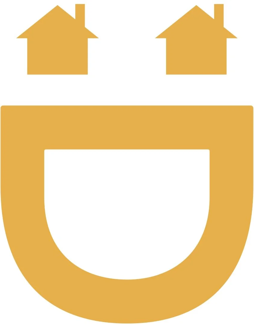 Two yellow house icons above a yellow U-shaped magnet symbol.