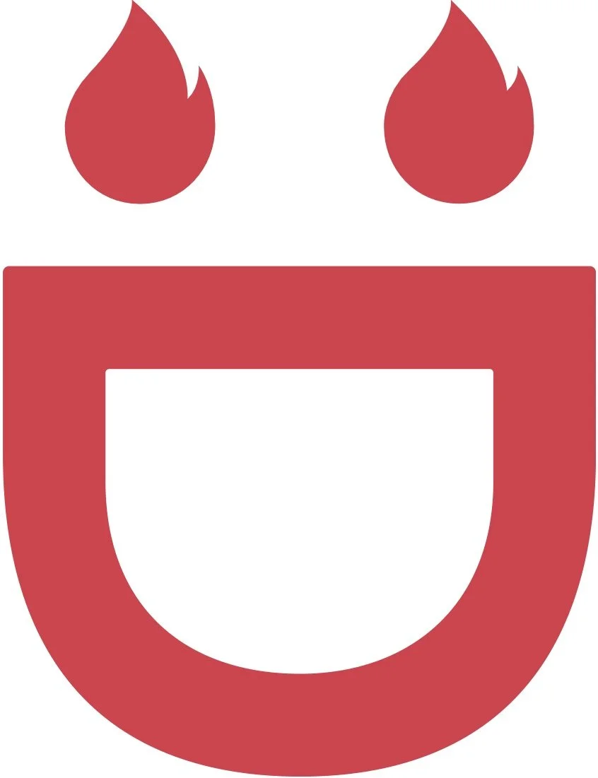 Cartoon face with two red flames as eyes, a red rectangular nose, and a large open white mouth.