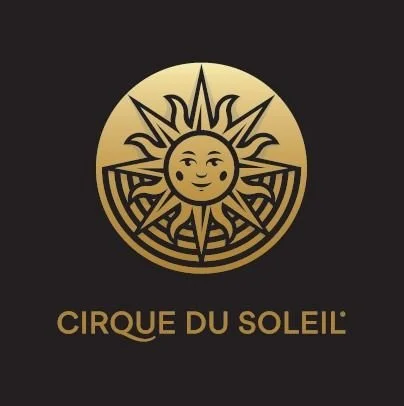 A logo for Cirque du Soleil featuring a smiling sun with rays, set against a black background with gold text.