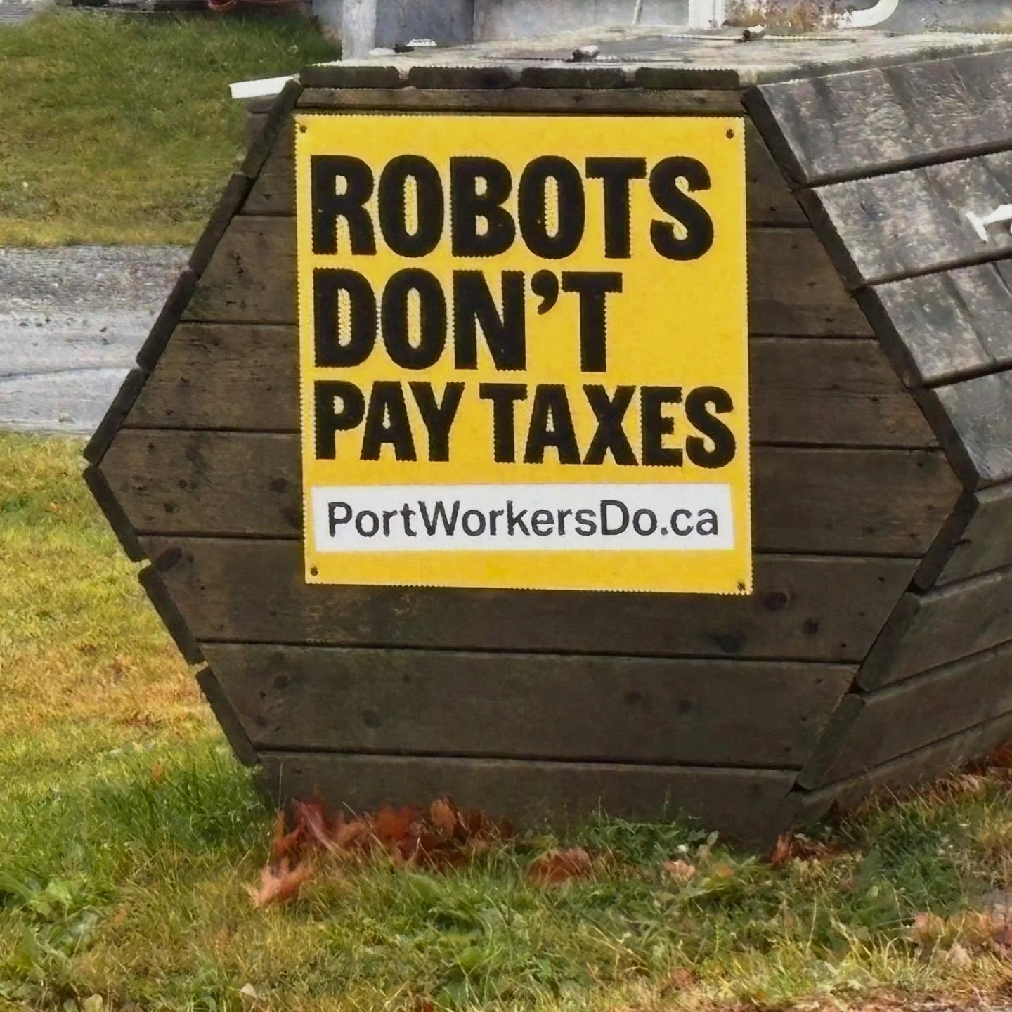 We live in the dystopian future my childhood sci-fi warned me about. Actual anti-robot political signs.

(I am only remarking on the fact that political yard signs about robots have become a reality. The issue itself is a Halifax local issue that has