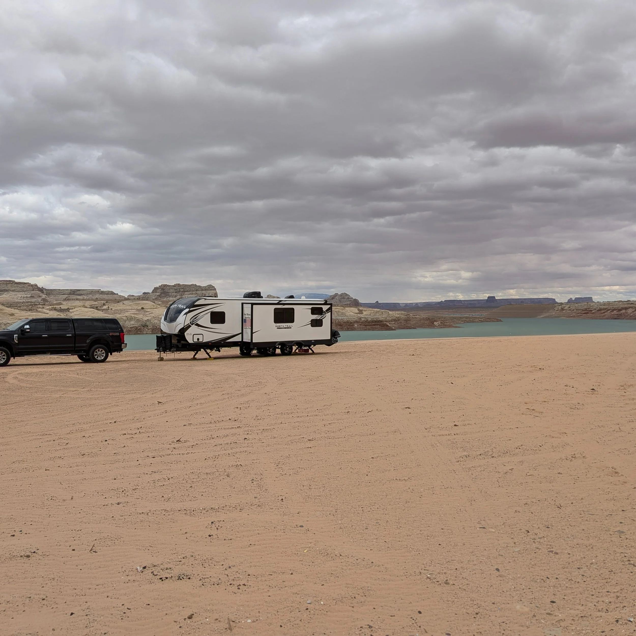 We'd never been to Lake Powell. And wow! What a unique place. 🏜️

Kelly and I spent 4 days boondocking at Lone Rock Beach (just north of Page, AZ) and explored the beauty of the area. The water level is way low - but that didn't stop us from soaking