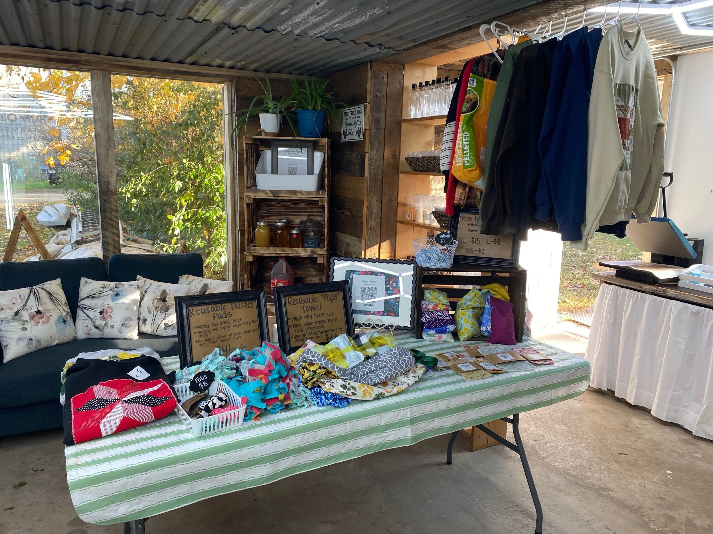 She&rsquo;s here! 🎨🌿

Bailey is set up in the shop today with her handmade creations, and the table looks amazing. Sweatshirts, bags, reusable cleaning products, garbage bag holders, and more, all made by hand, right here in our community.

Small b