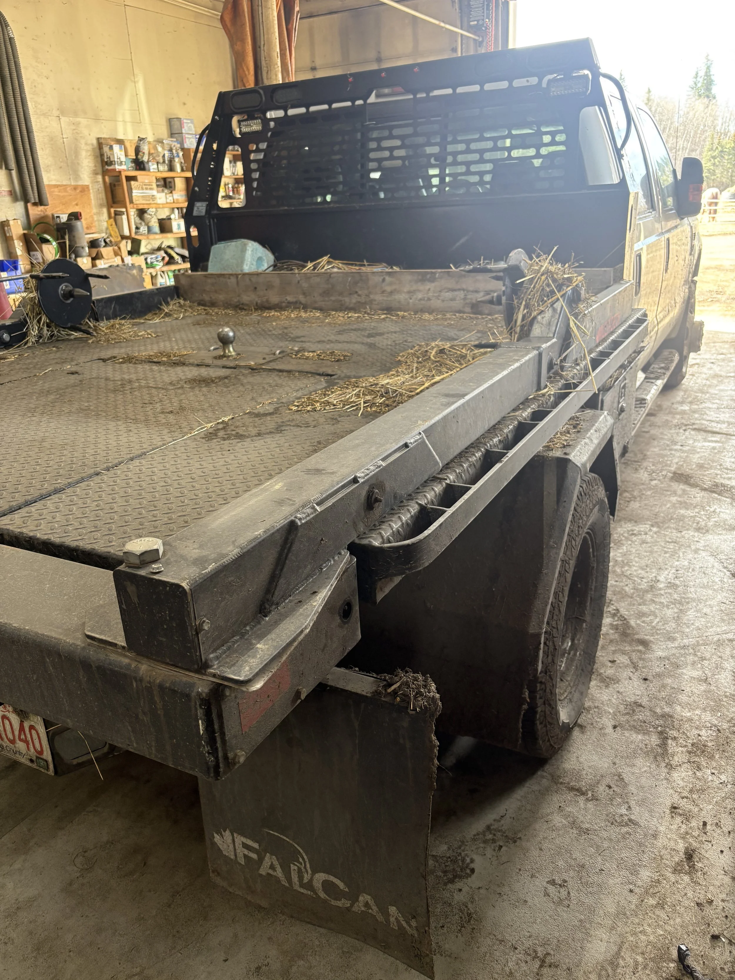 Beginning of the Bale Deck Swap. This is the Deck that was on the old truck that needed to come off.