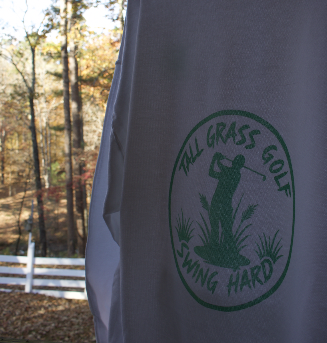 OG golf hoodie back logo closeup.png