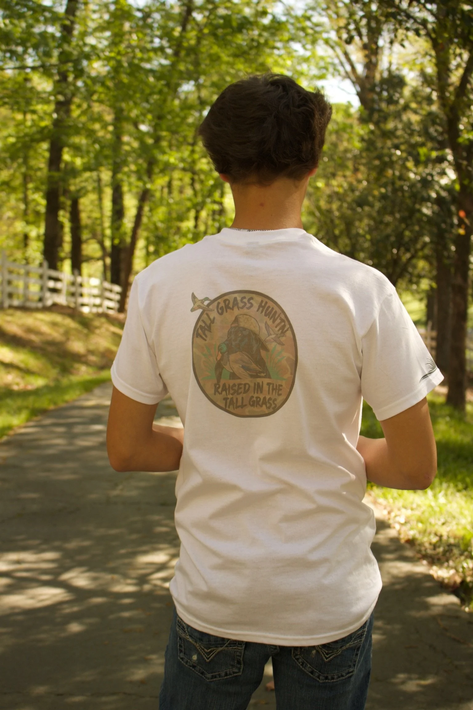 RAISED IN THE TALL GRASS TEE SHIRT