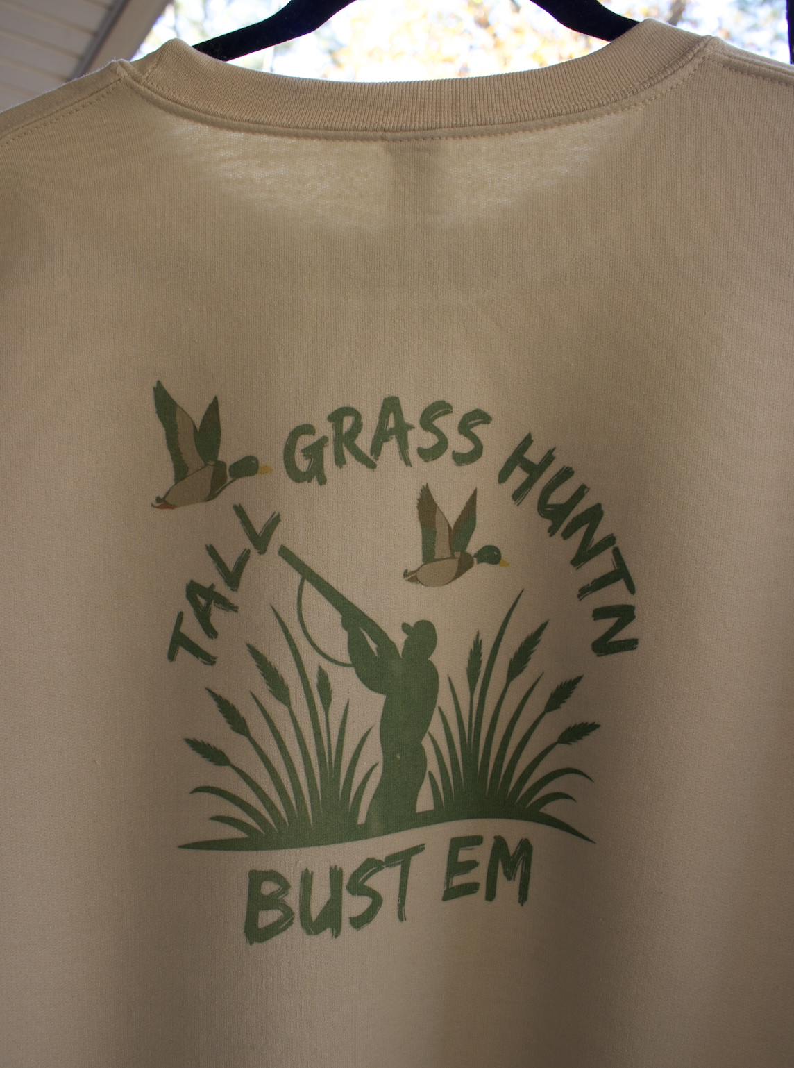 huntn "bust em" crewneck back logo closeup.png