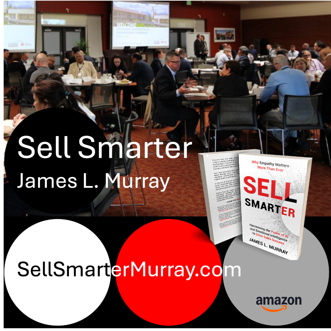 A conference room filled with people seated at tables, engaging in discussions. The room has a large screen at the front displaying a welcome message. There is a book titled 'Sell Smarter' by James L. Murray in the foreground, along with the website sellsmartermurray.com and an Amazon logo.