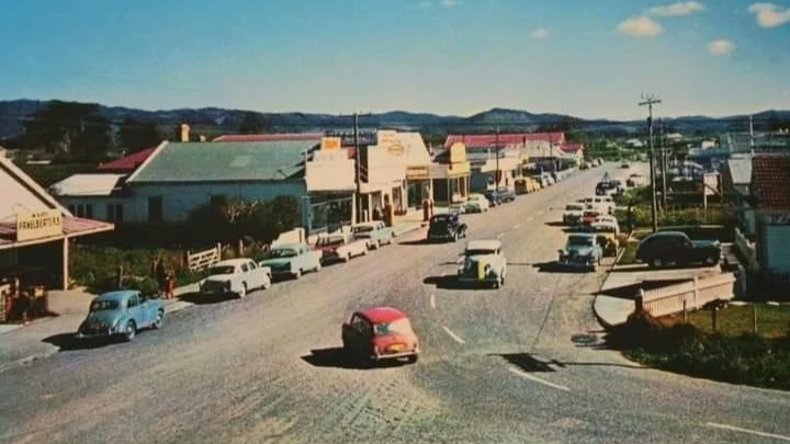 Charming vintage view of the historic Waipu main street and township, showcasing the deep heritage of the Bream Bay area. Sell your Bream Bay property with James Alexander and Charlotte Daun.