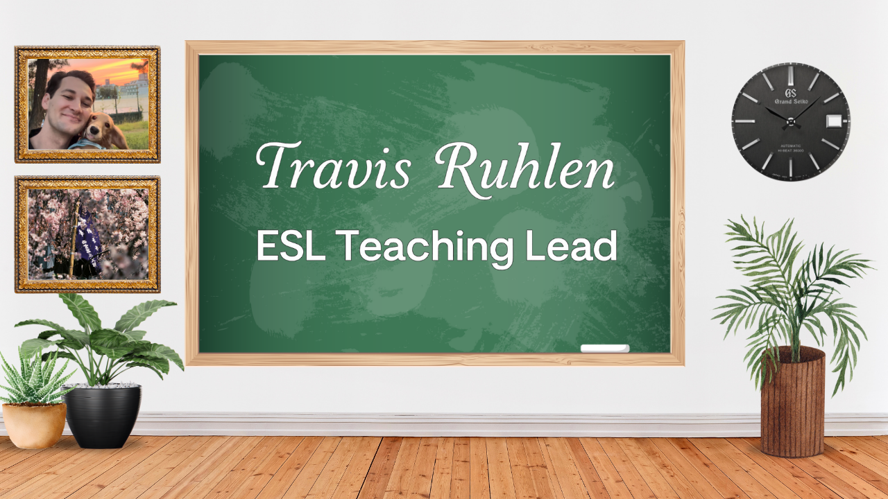 A classroom wall with a chalkboard displaying the name Travis Ruhlen, ESL Teaching Lead. There are two framed photos on the left, a black clock on the right, and potted plants on the floor below.
