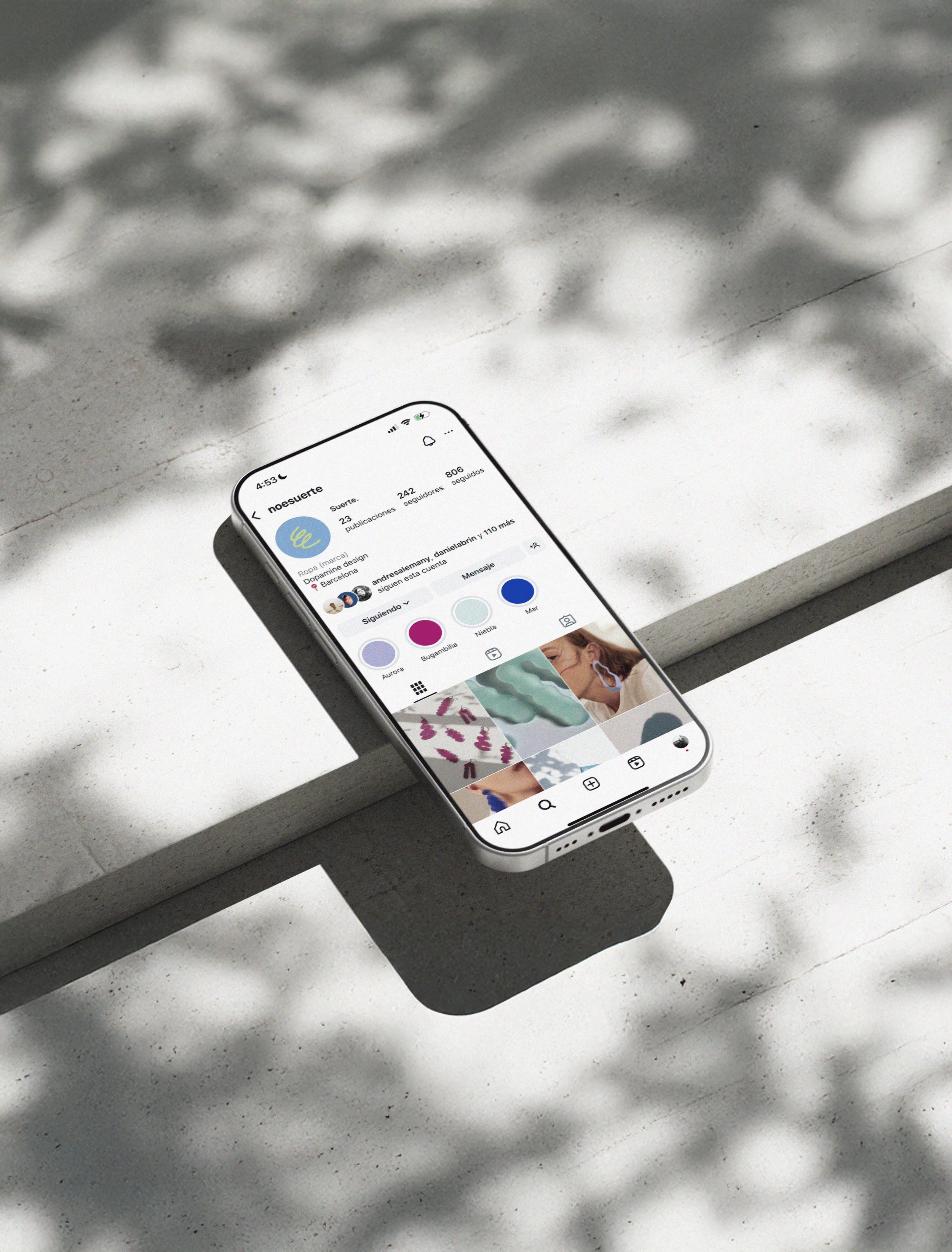 01 Free iPhone 16 Pro Mockup on Bright Concrete Surface with Shadows 2 (1).png