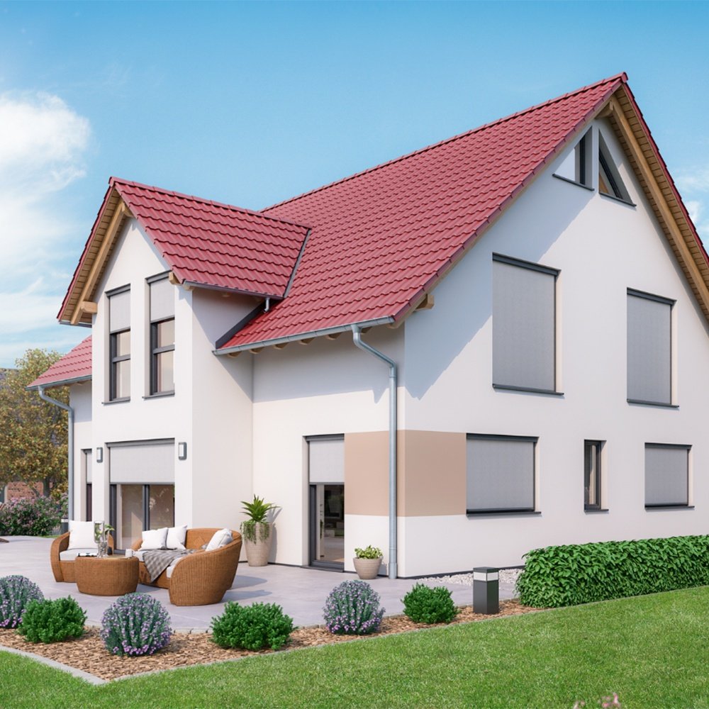 Modernes Mehrfamilienhaus mit rotem Ziegeldach und weißen Wänden, umgeben von einem gepflegten Garten mit bunter Bepflanzung und Sitzgruppe im Vordergrund.