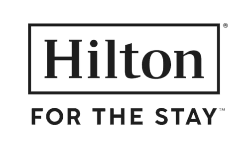 Hilton logo with slogan 'For the Stay'