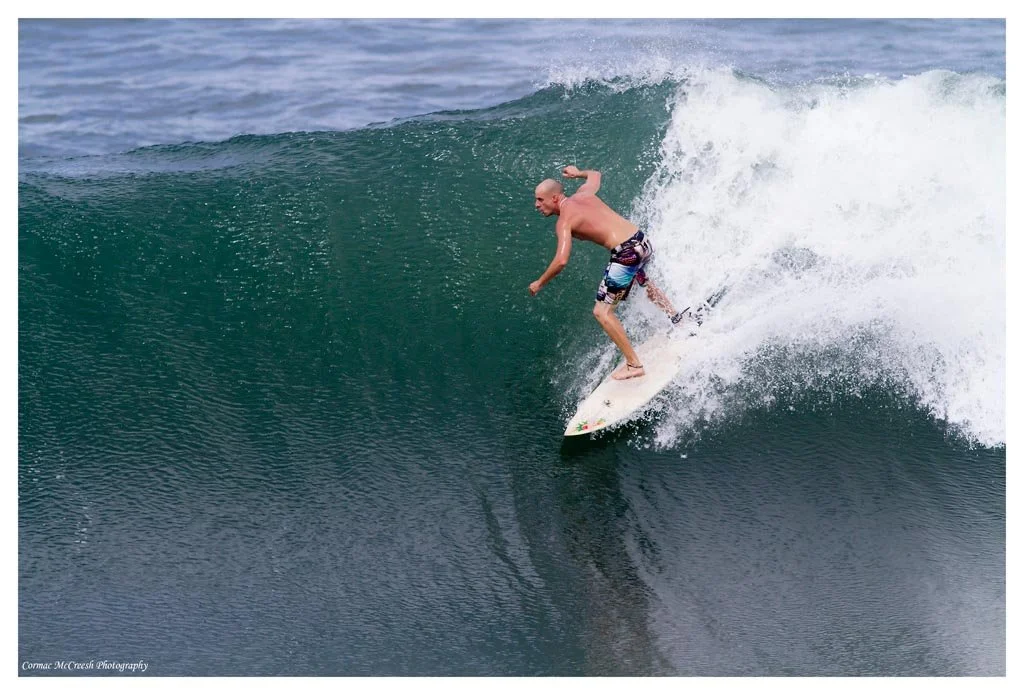 Mitchell Harty gets up on a big wave during cyclone Irina