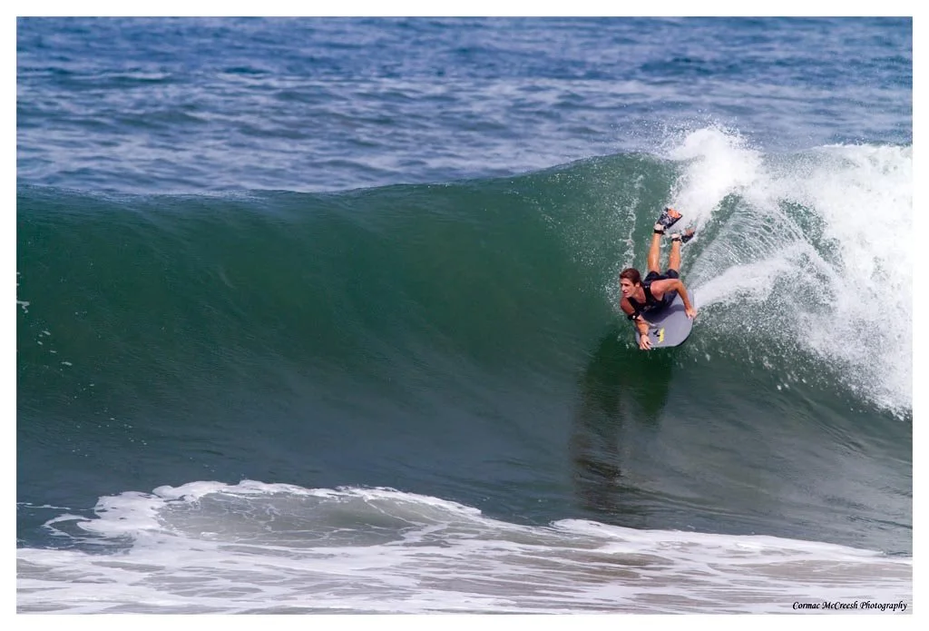 Body boarding during cyclone Irina