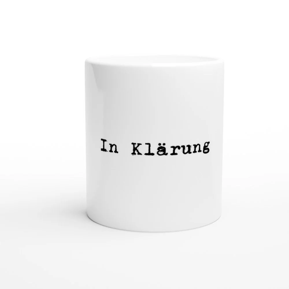 In Klärung, weiße Keramiktasse /Kaffeebecher