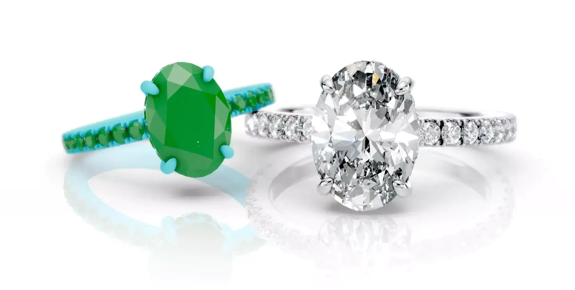 Two rings on a white surface, one ring with a large oval-shaped diamond and the other with a large green gemstone, both with smaller diamonds along the bands.