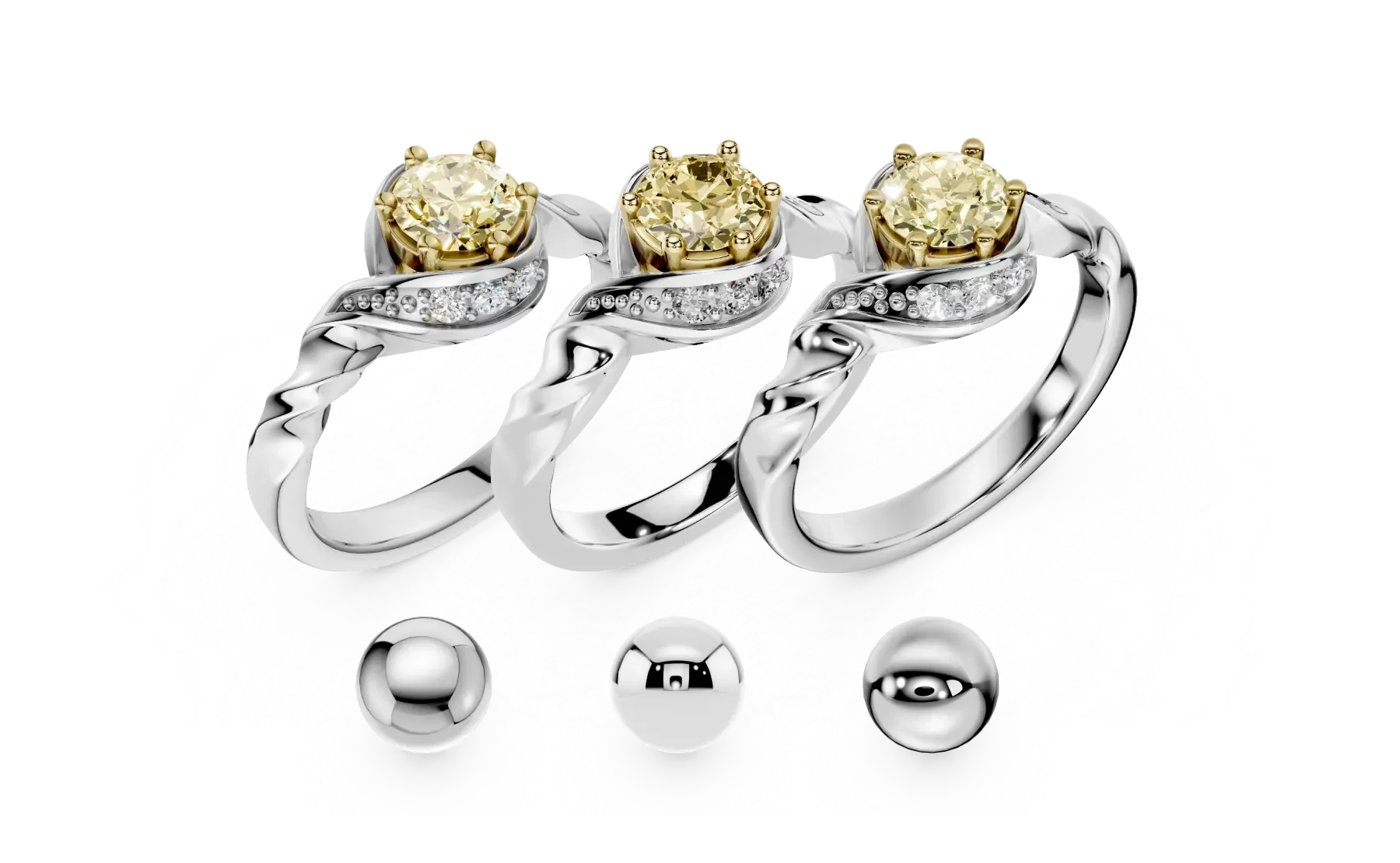 Three silver rings with gold-colored gemstones and small diamonds, displayed on a textured white surface with metal balls below.