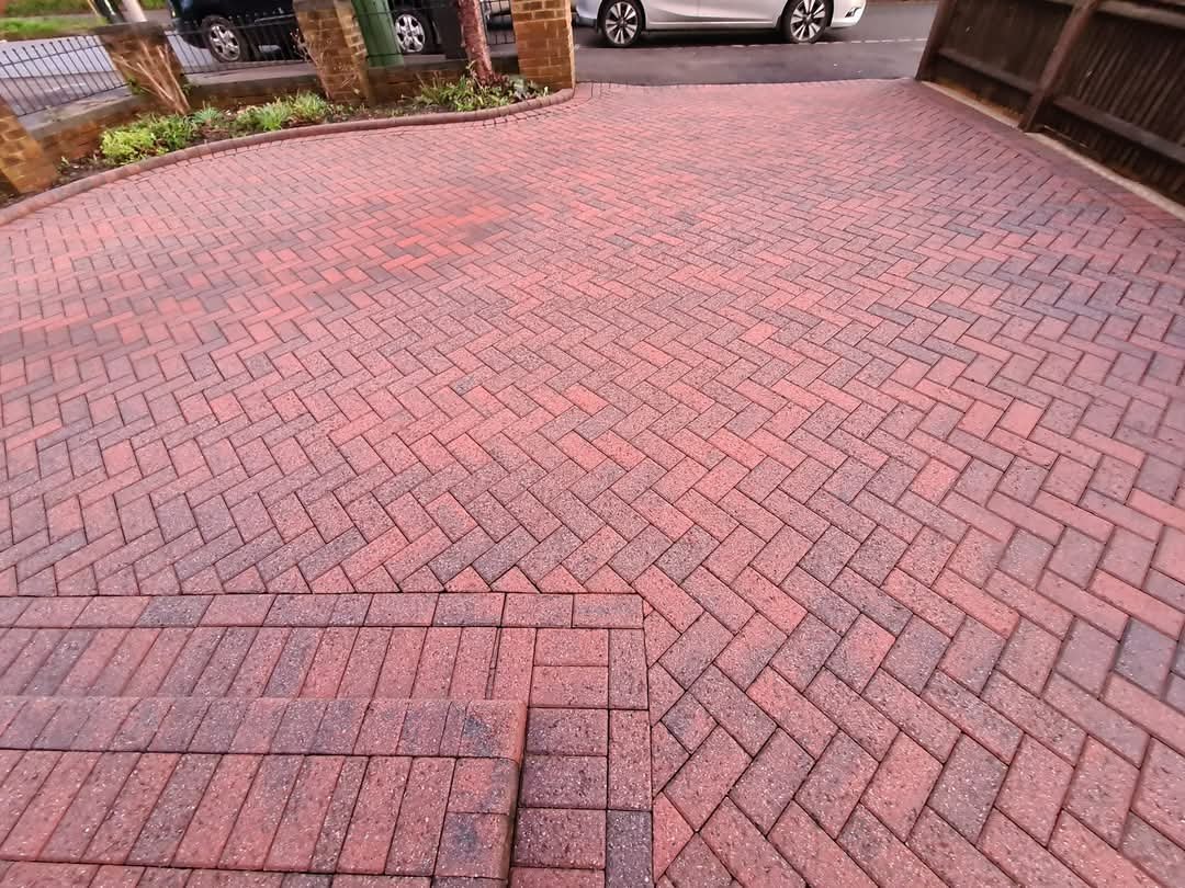 After image of driveway completely transformed in Reading. Driveway cleaning and moss removal services by Immaculate Services.