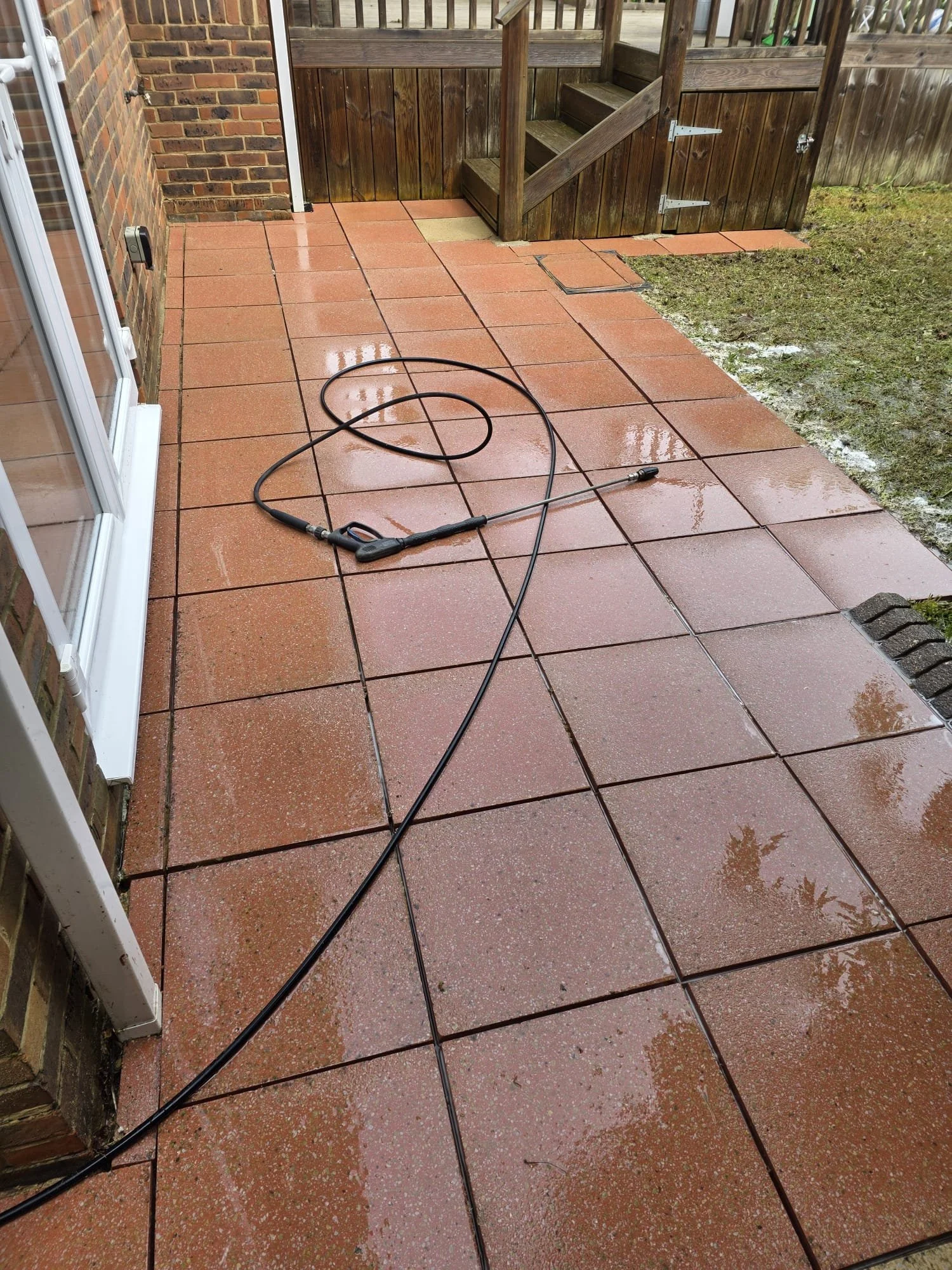 Patio restored following professional pressure washing in Reading.