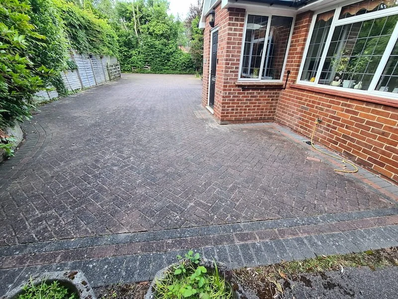 Before image of driveway in Sonning before being restored