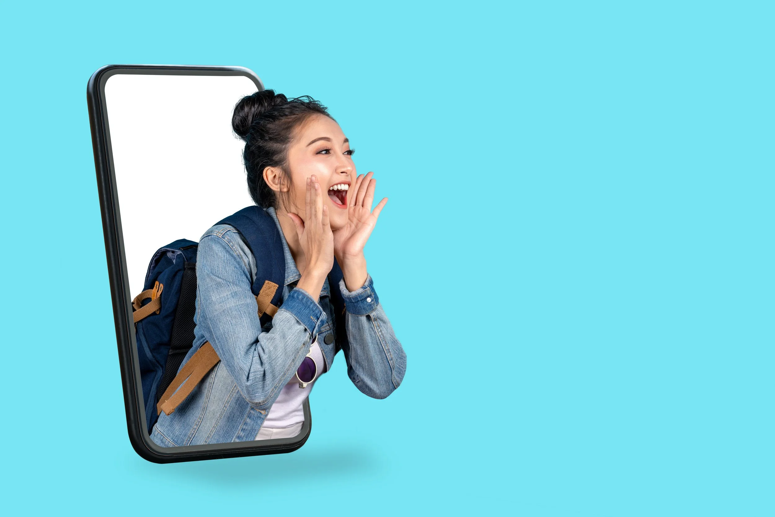 Young woman with a backpack and denim jacket emerging from a smartphone screen, shouting excitedly, set against a light blue background.