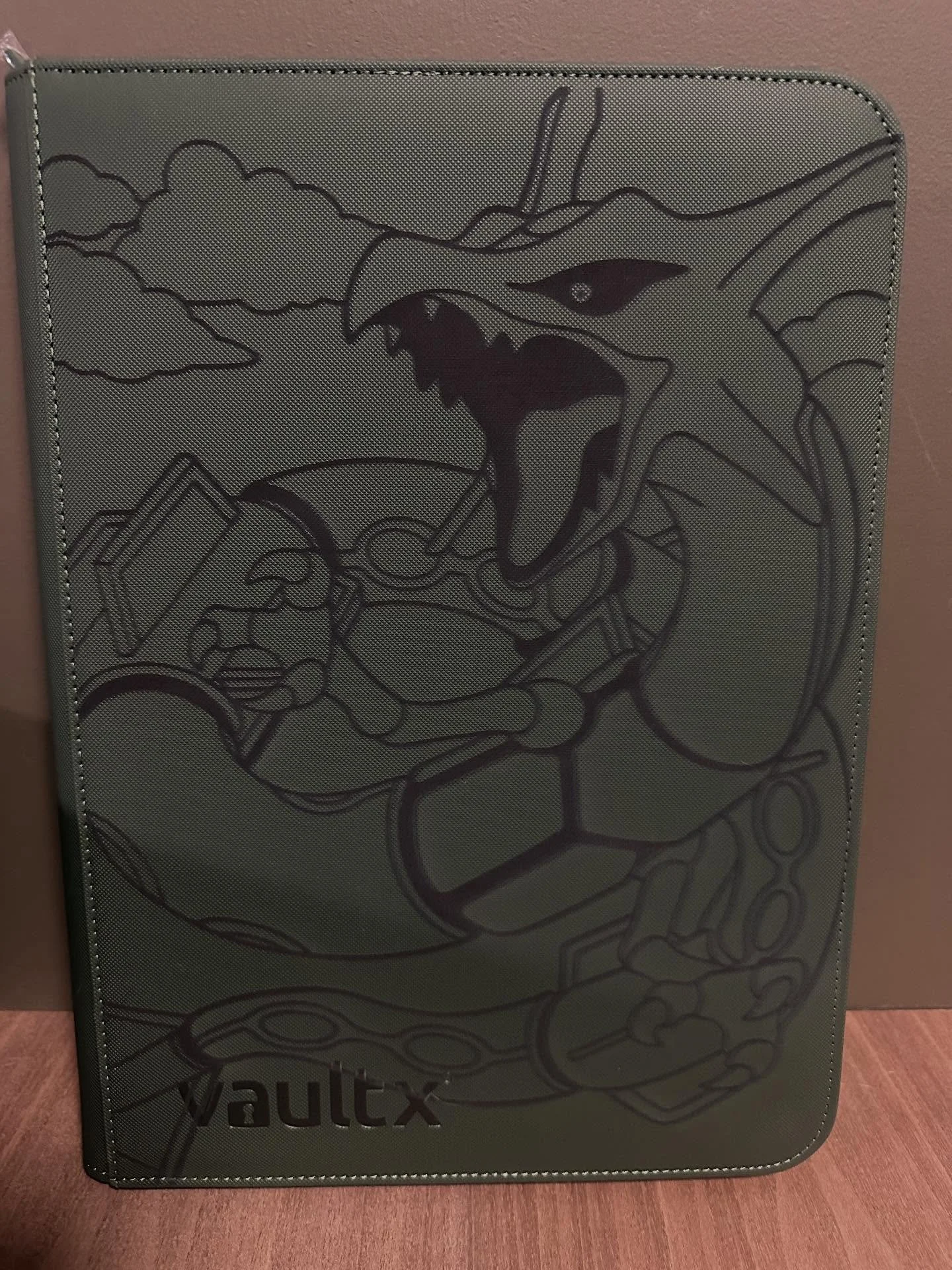 Something about how the green VaultX engraves&hellip;. definitely my favorite 😍 #EliteBinderStatus #CustomBinder #Pokemon #Rayquaza