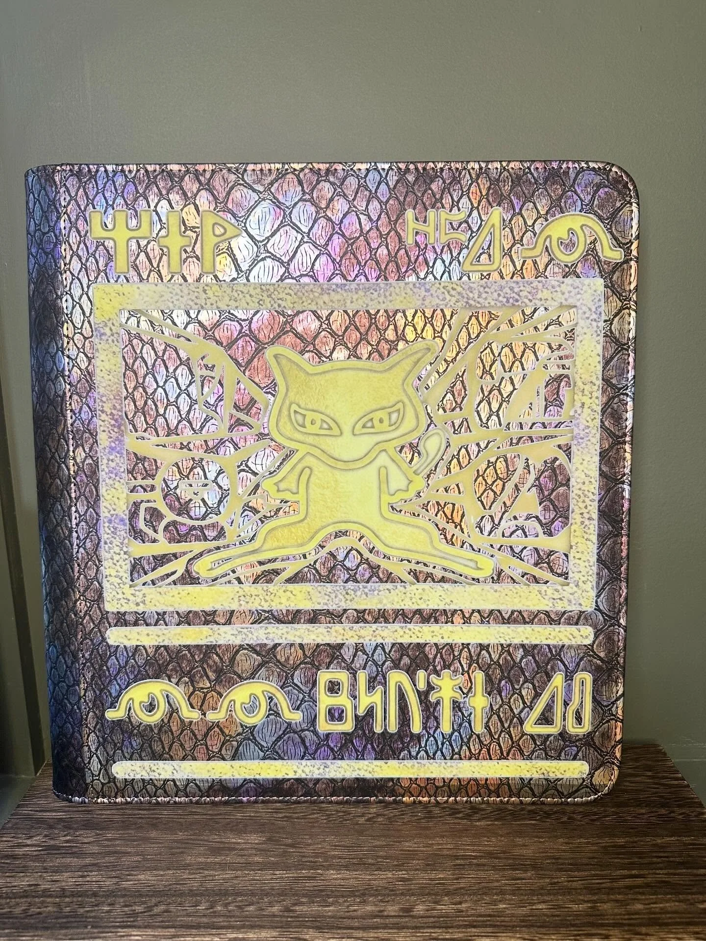 Ancient Mew. 

Really could not have chosen a better artwork for this binder. Go get yourself an @obsidian_supplies binder&hellip; better yet, let me get one for you and make it custom ✨ 

OBSIDIAN x HOUSEOFEEVEE

#EliteBinderStatus #CustomBinders #P