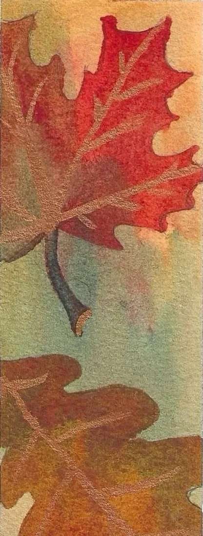 Autumn red and orange maple leaves against a pastel background