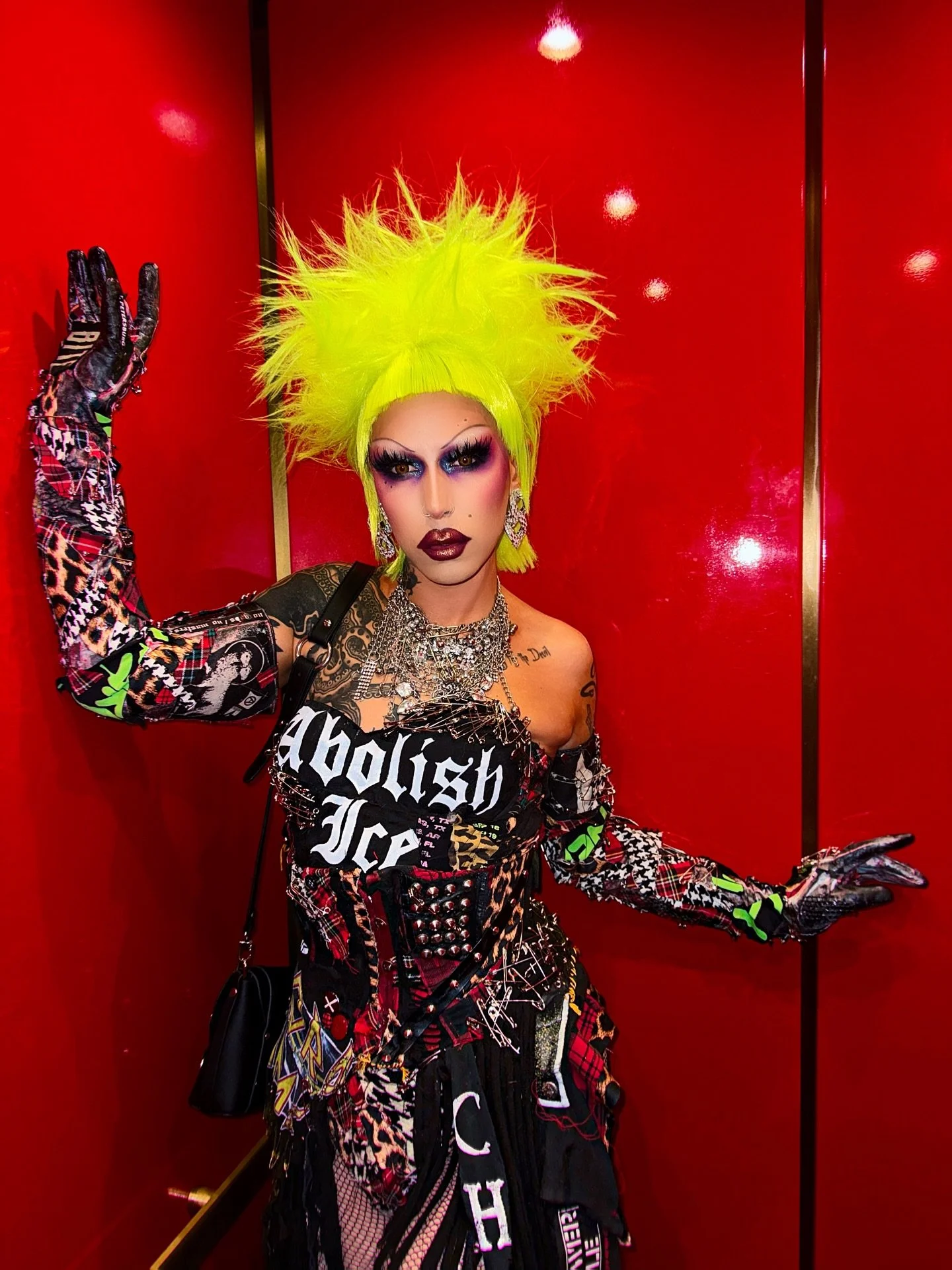 ABOLISH ICE
elevator shot from press week day 2!

Outfit painted by me. 
Assembled by @gidgetvonaddams using old punk tees and patches 
Gloves by @kat.sass 
Hair by me