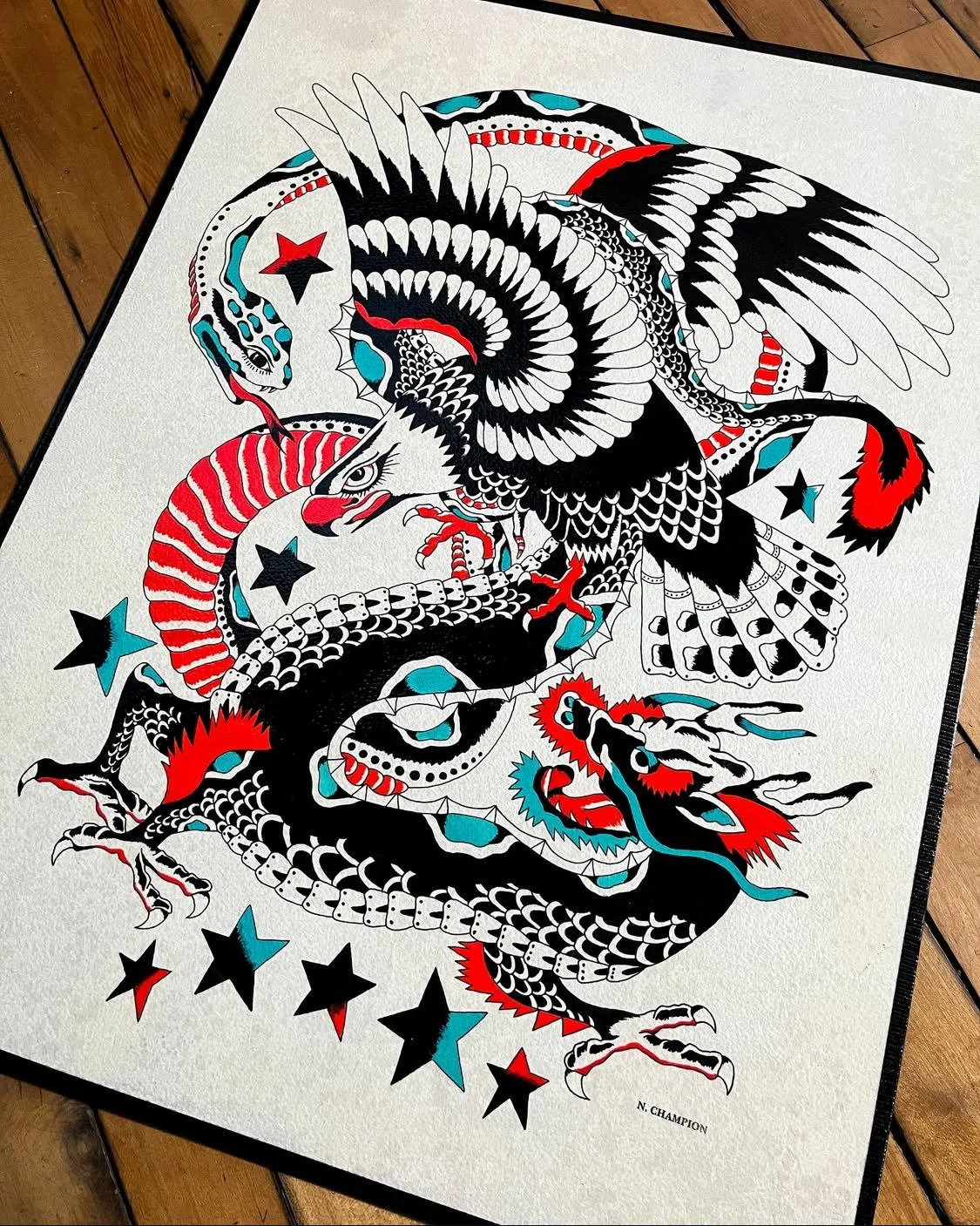 Tattoo-style drawing of a fierce eagle with detailed feathers, claws, and beak, intertwined with a dragon, surrounded by red, black, and blue stars on a white background.
