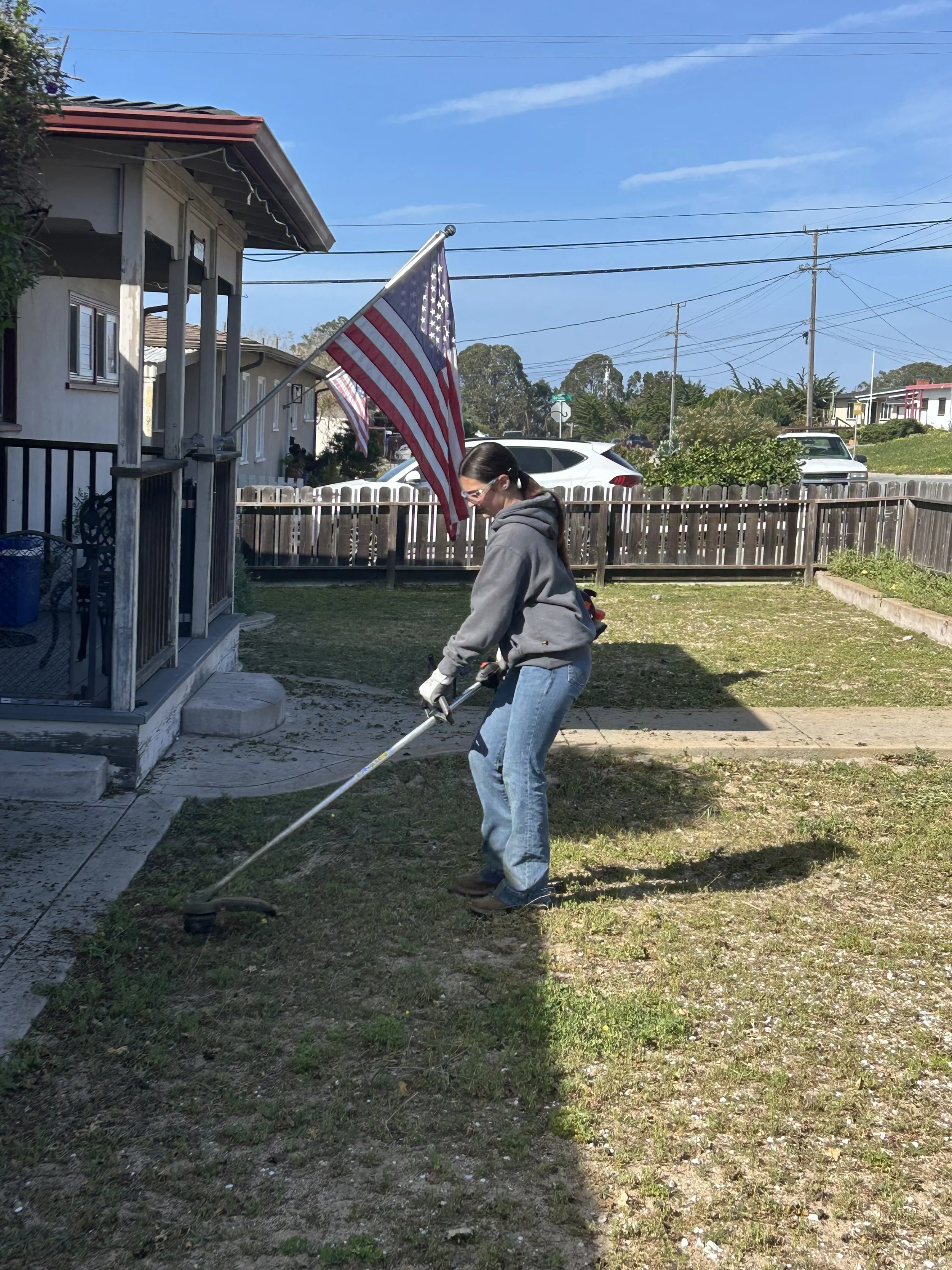 Brenna doing yard work