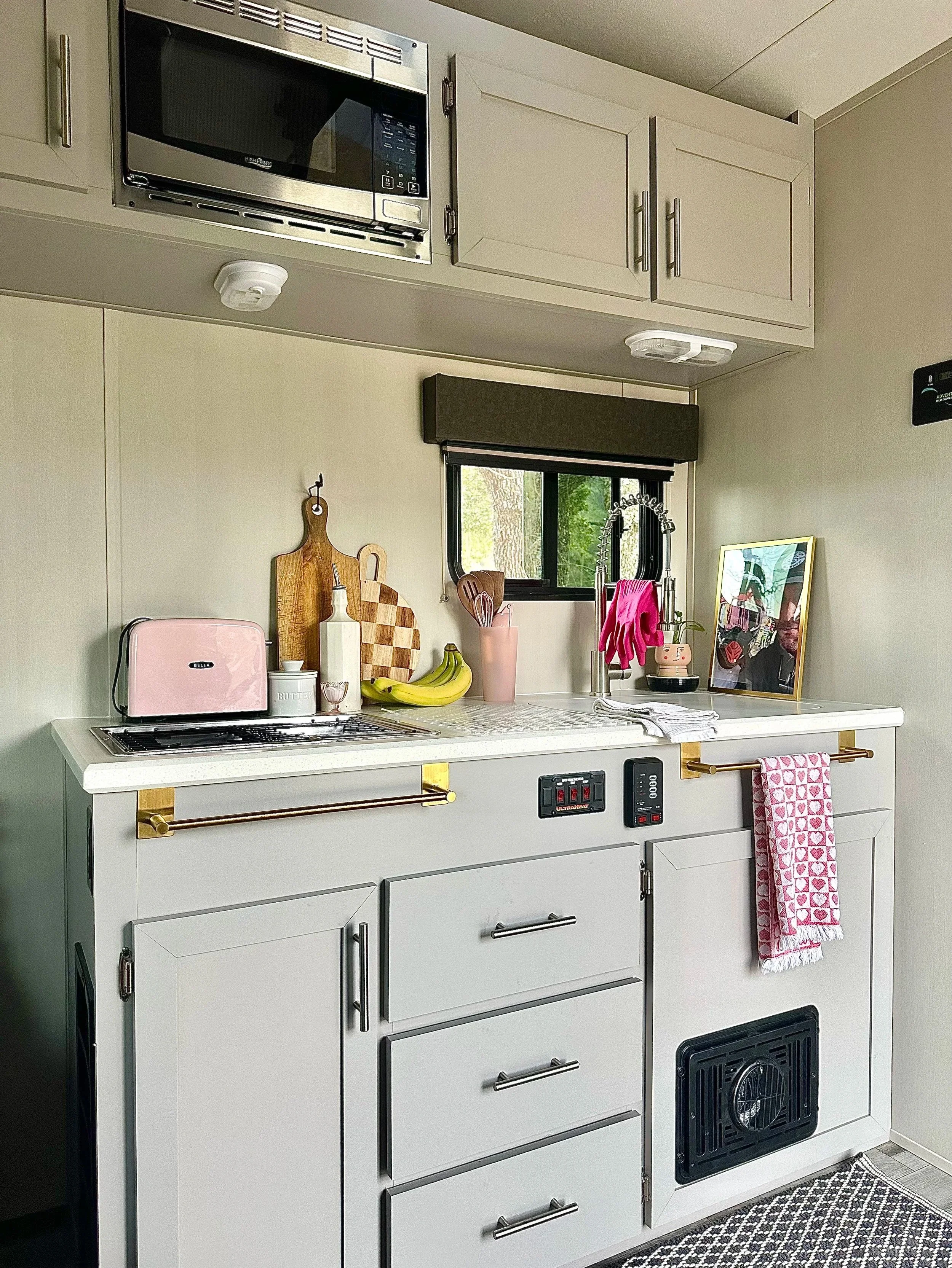 RV kitchen decorated with pink accents. items are all linked to my Amazon Storefront