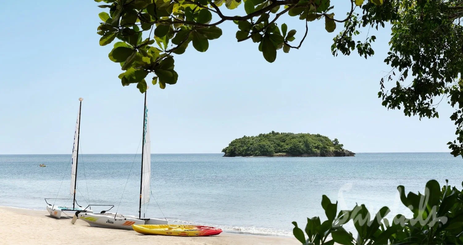 Sandals Halcyon Beach resort cottage-style accommodations surrounded by lush tropical gardens, Castries, St. Lucia