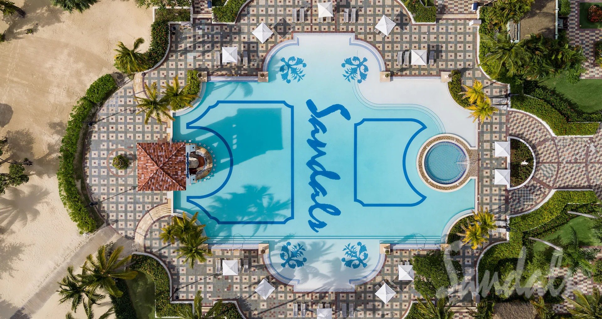 Sandals South Coast heart-shaped overwater bungalows above crystal clear water, Whitehouse, Jamaica