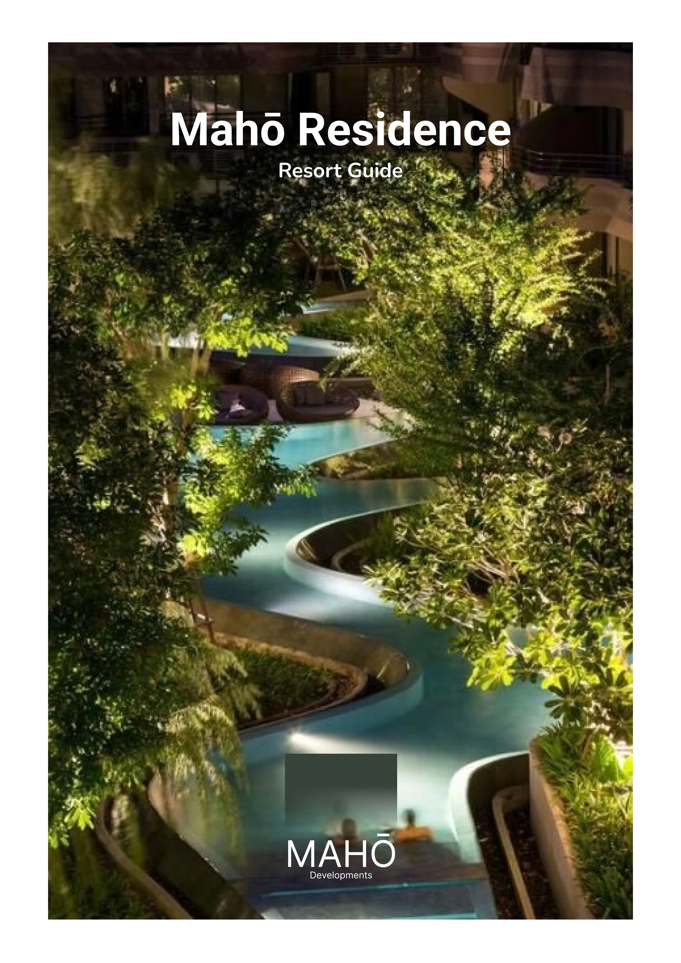 Nighttime view of Mahō Residence resort with a winding water slide surrounded by lush greenery and illuminated seating area.