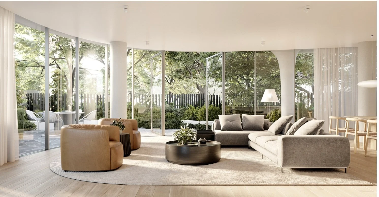 Modern living room with large floor-to-ceiling windows, beige and gray sofas, a round black coffee table, and a view of a lush green garden outside.