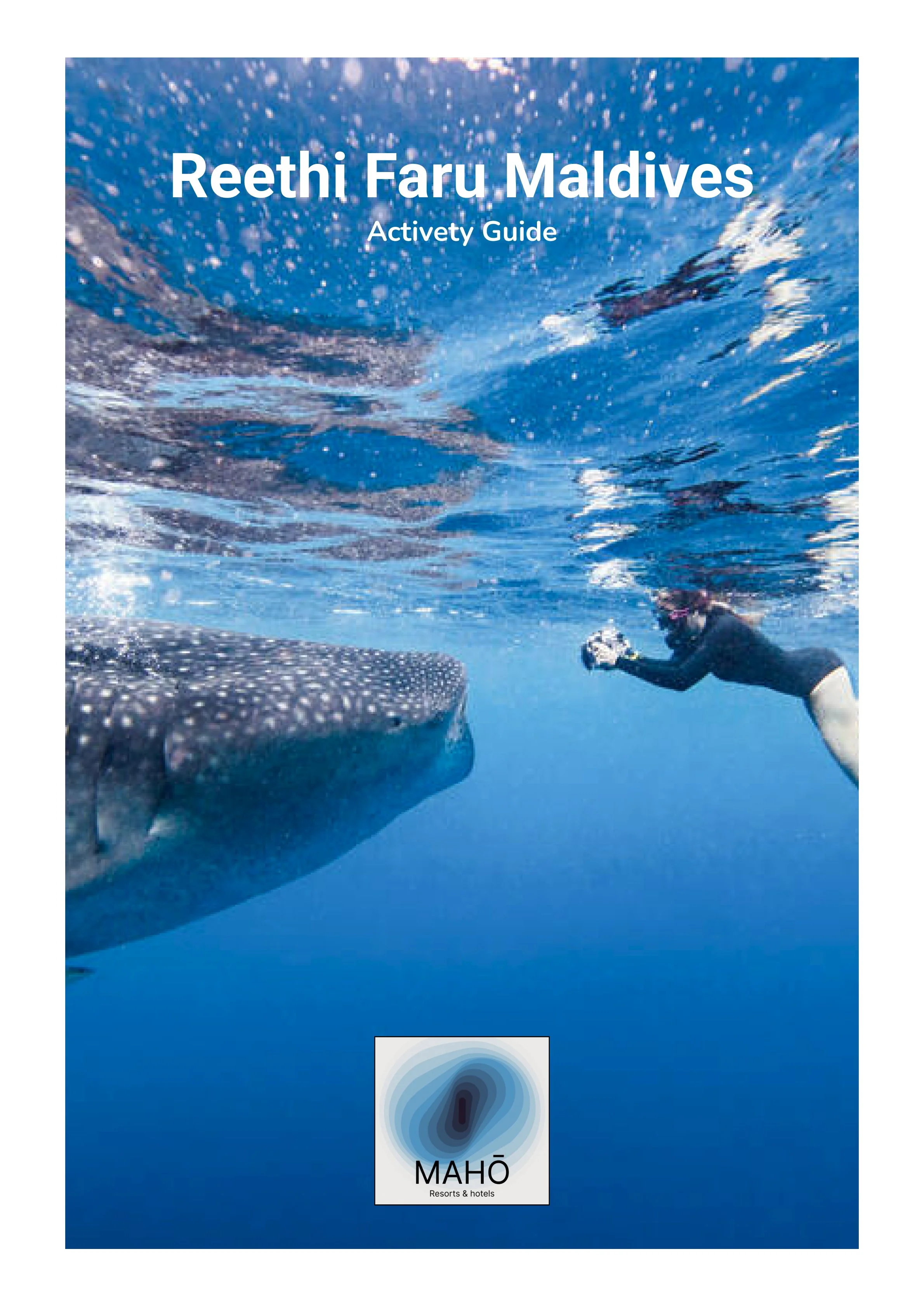 Cover of an activity guide featuring an underwater photograph of a person taking a picture of a whale shark in the Maldives.